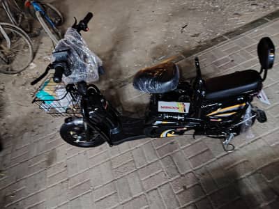 electric scooty size 16 my WhatsApp 97658846