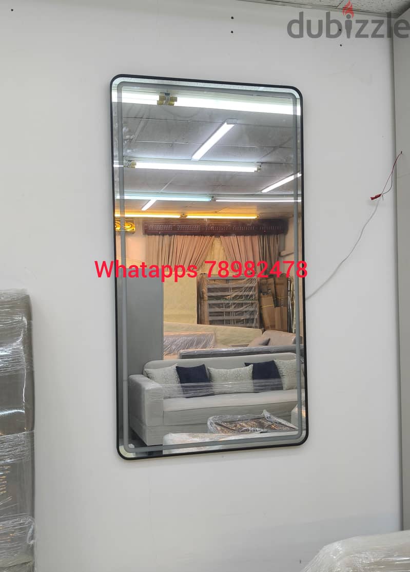 New mirror with light available. 3