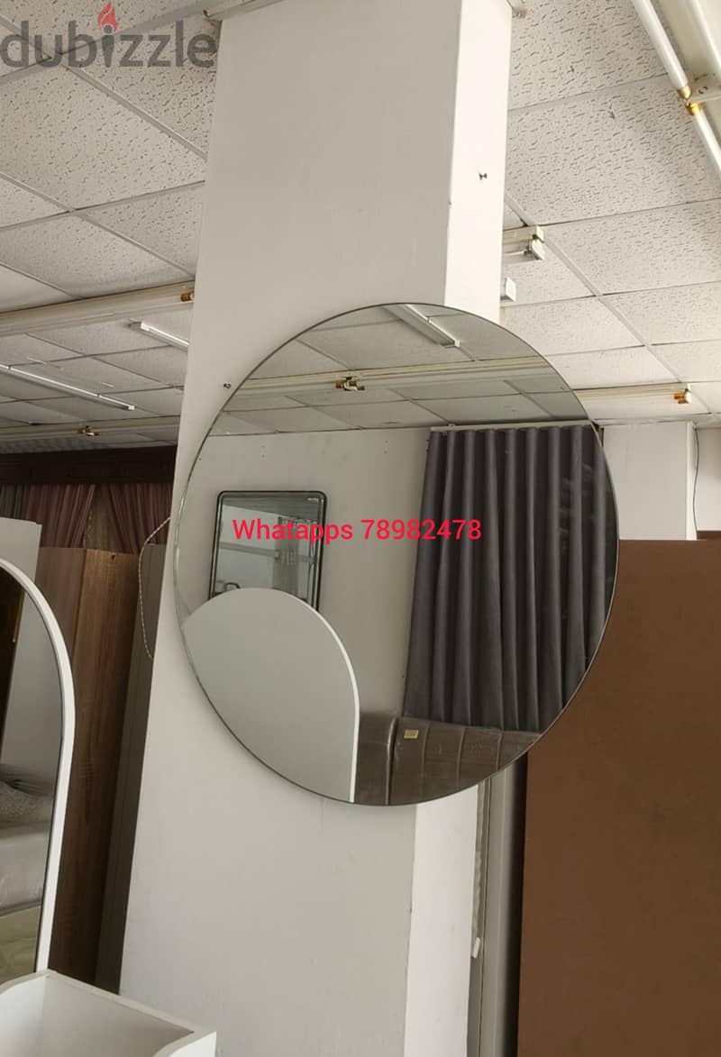 New mirror with light available. 5