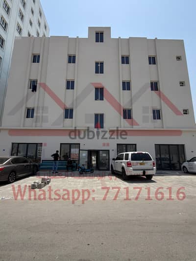 بناية جديده ب شقق و محلات للايجار في المعبيله الجنوبيه