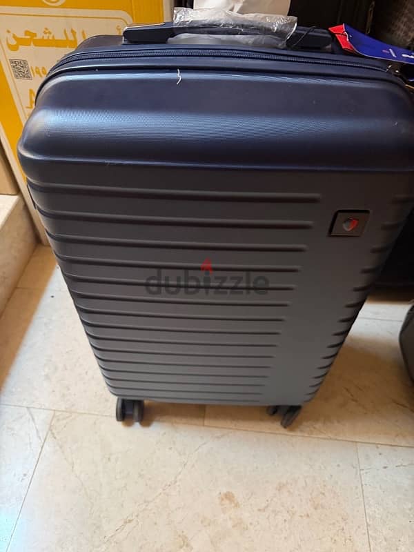 Travel trolley bag 4 wheels 24” plastic and fabric 1