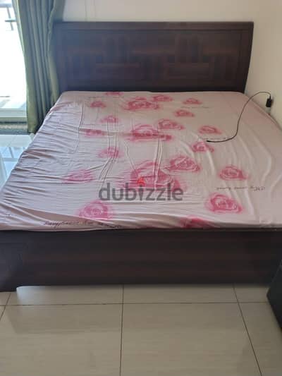 king size bed with storage, dressing table and study table with chair