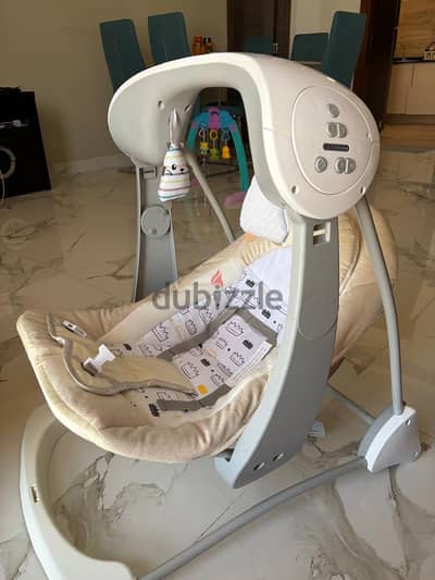 Red tag deluxe take along swing n seat electric