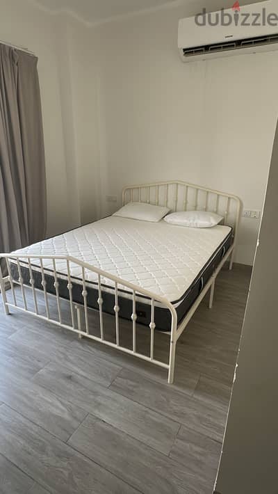 Bed with mattress