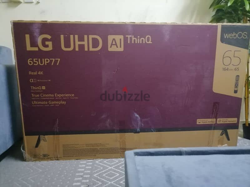 LG TV 65 " smart 4k UHD with broken screen for 40 RO 9