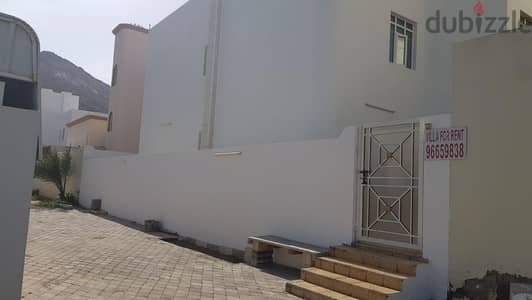Villa B behind