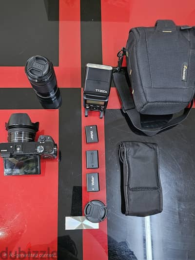 Sony A6000 Complete Photography Kit – 2 Lenses, Godox Flash, 3 Batteries & Bag