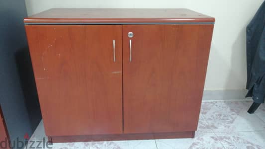 “Wooden 2-door storage cabinet / office cupboard for urgent sale