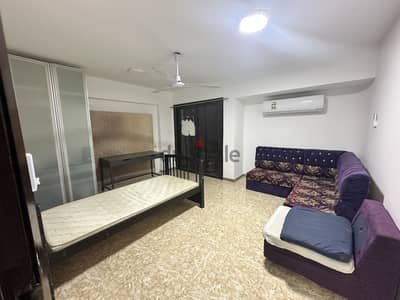 Room for rent in al Khuwair including water Electricity and wifi