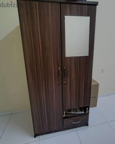 Bed and cupboard