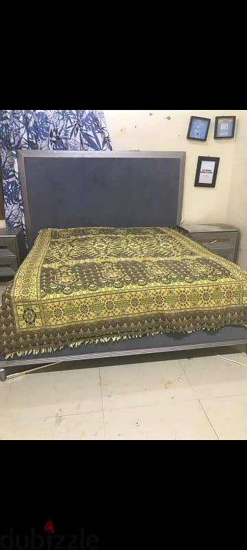 king size bed with 2 side table