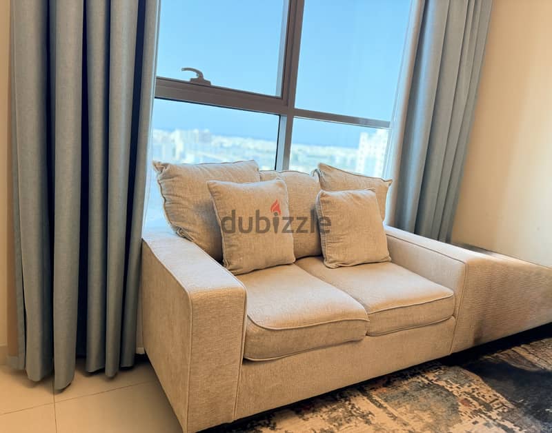 3 seater comfy beige sofa 2