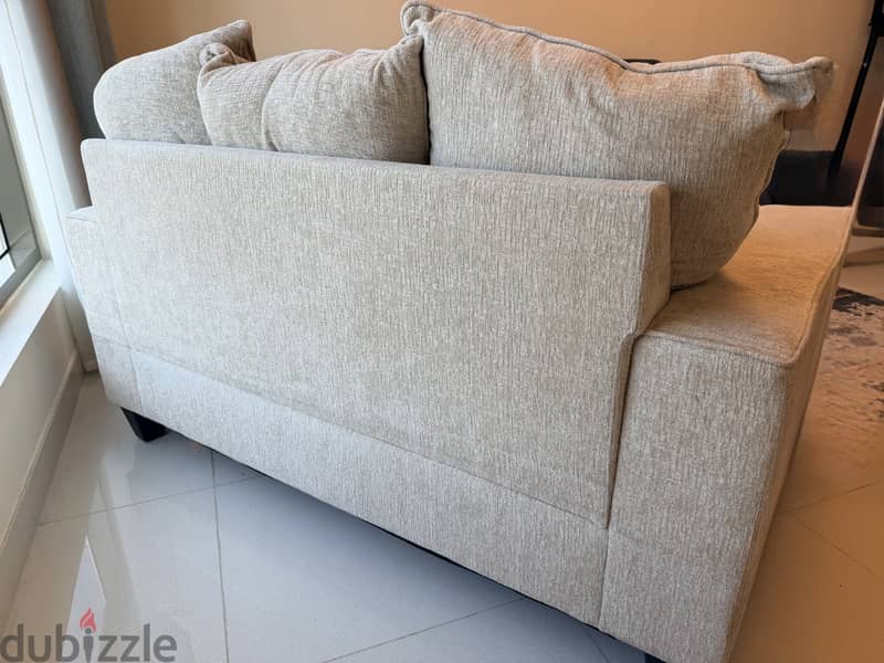 3 seater comfy beige sofa 3