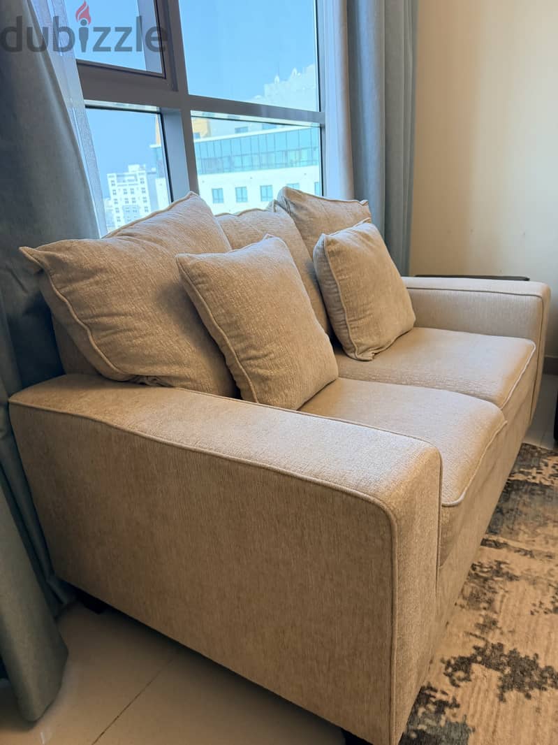 3 seater comfy beige sofa 4