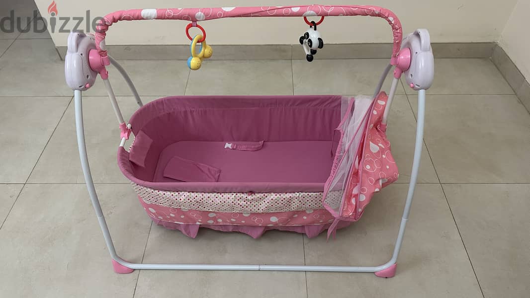 Manually operated baby swing 1