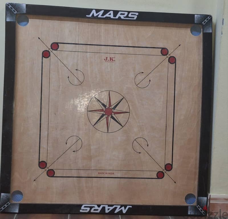 Carrom board with puck and striker 2
