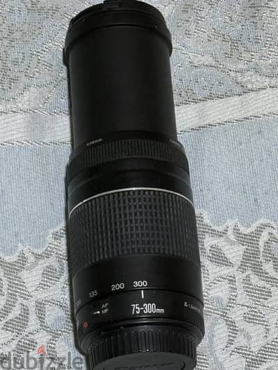 عدسة زون كانون ٧٥-300 mm