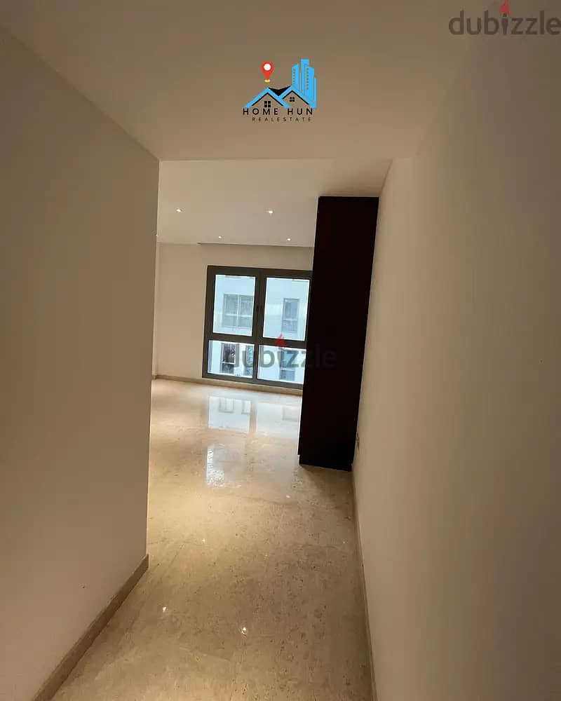 MUSCAT HILLS | SPACIOUS 1BHK MODERN APARTMENT WITH POOL VIEW 4
