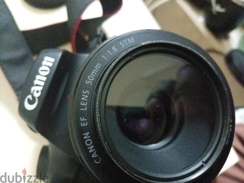 dslr Canon 4000D camera +memory+charger+bettery+lens+bag 3
