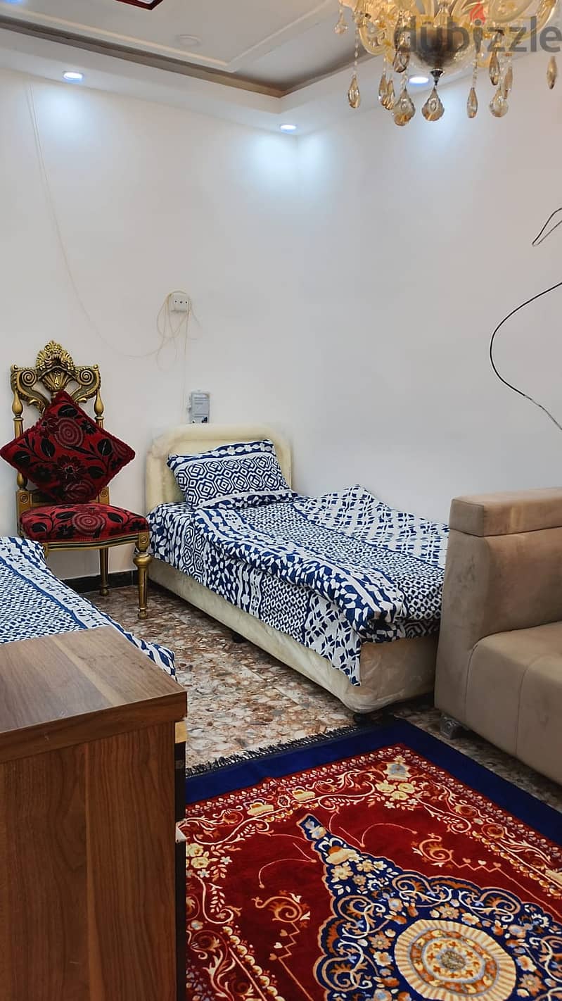 town  house  of two bed rooms and two bath rooms  a kitchen  fully furnished 2
