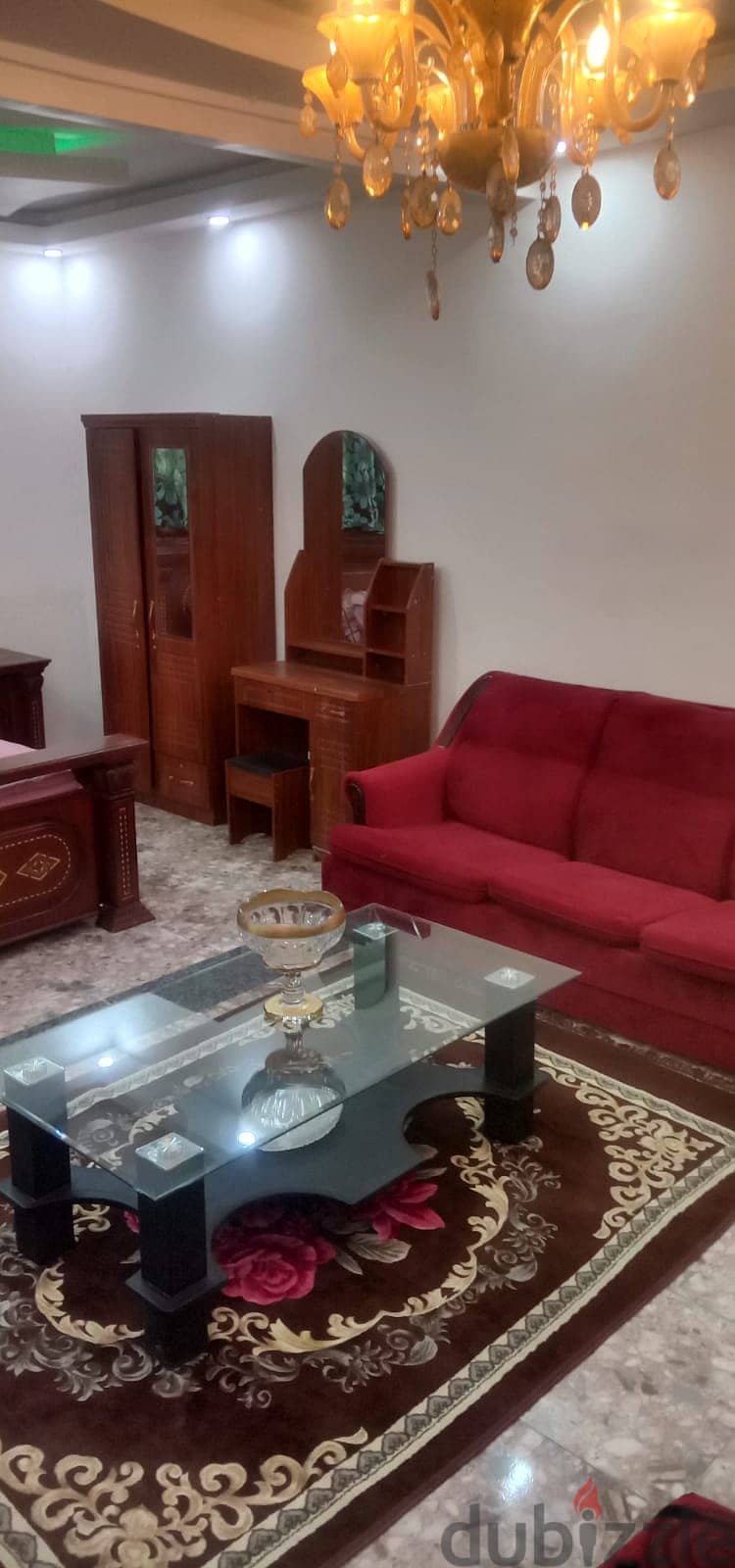 town  house  of two bed rooms and two bath rooms  a kitchen  fully furnished 3