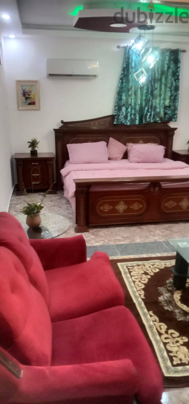 town  house  of two bed rooms and two bath rooms  a kitchen  fully furnished 4