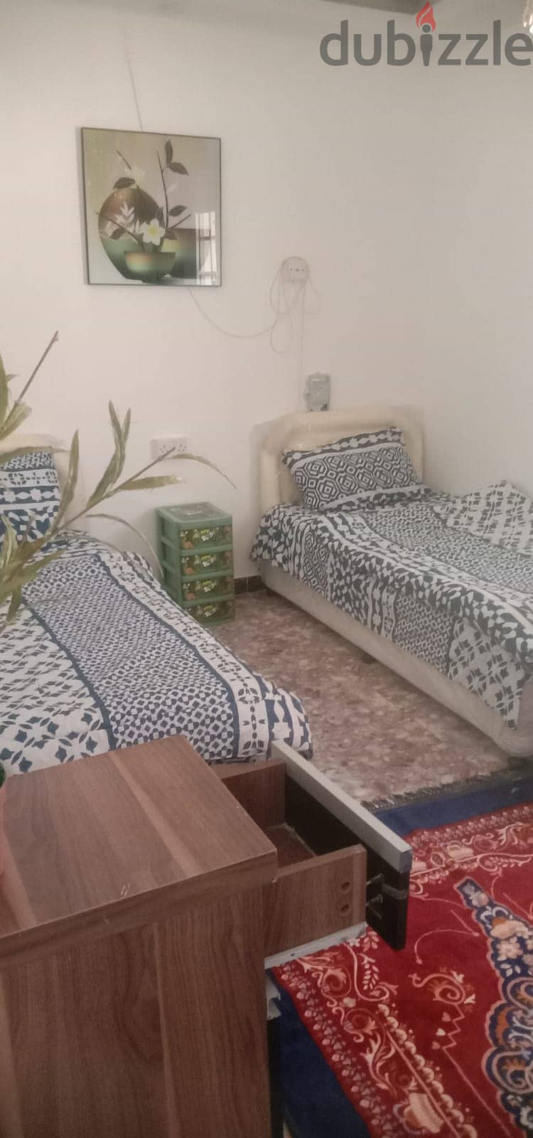 town  house  of two bed rooms and two bath rooms  a kitchen  fully furnished 8