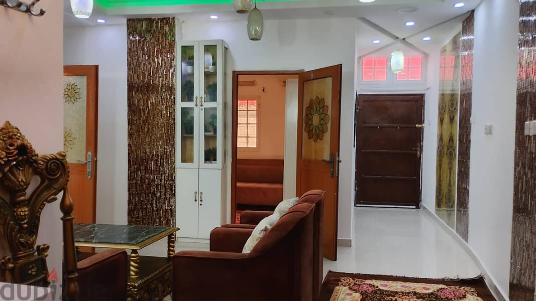 town  house  of two bed rooms and two bath rooms  a kitchen  fully furnished 15