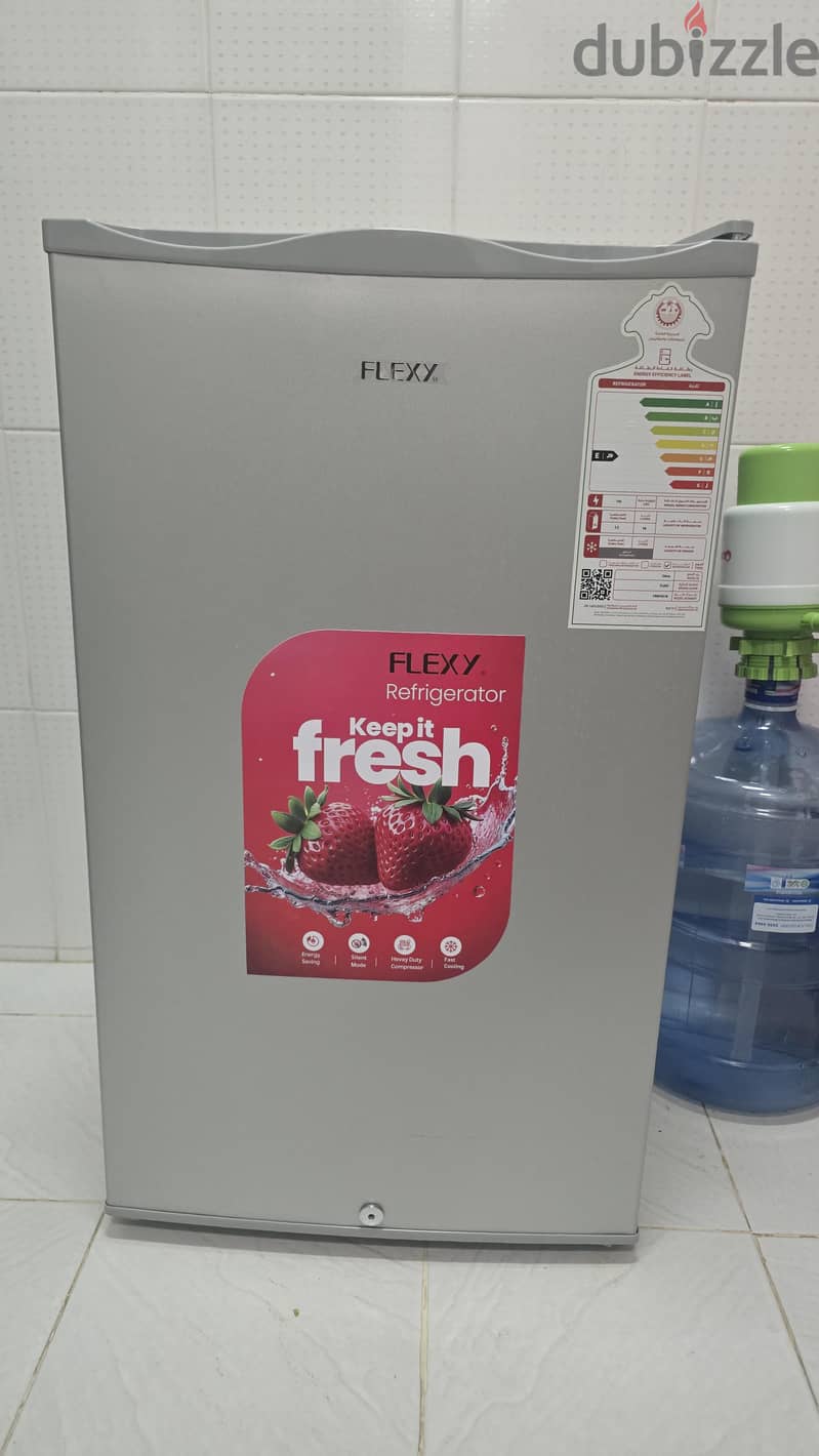 90 liter refrigerator, Flexy brand, new and mint condition. 4