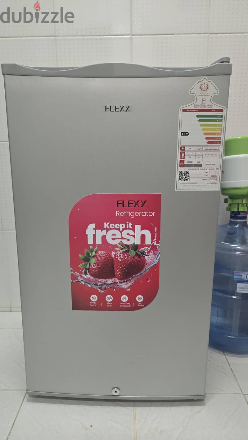 90 liter refrigerator, Flexy brand, new and mint condition. 5