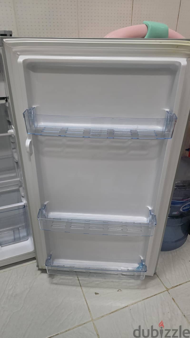 90 liter refrigerator, Flexy brand, new and mint condition. 7