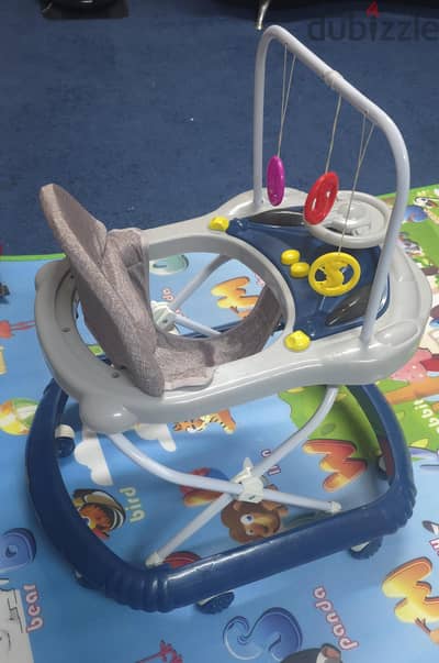 Baby Walker with Music & Toys - Excellent Condition