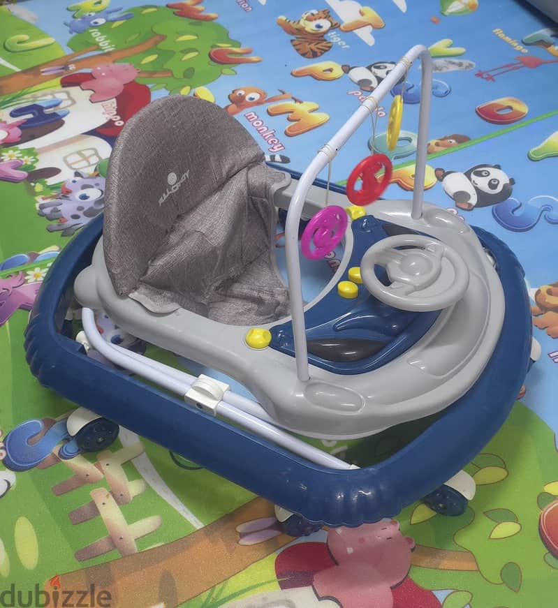 Baby Walker with Music & Toys - Excellent Condition 1