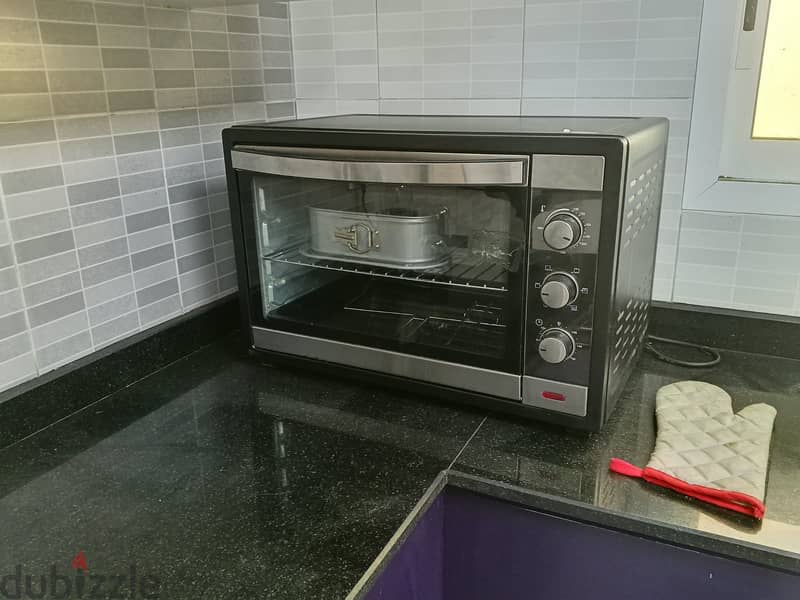 Geepas 60L Electric Oven + Prestige Square Baking Pan Combo 3