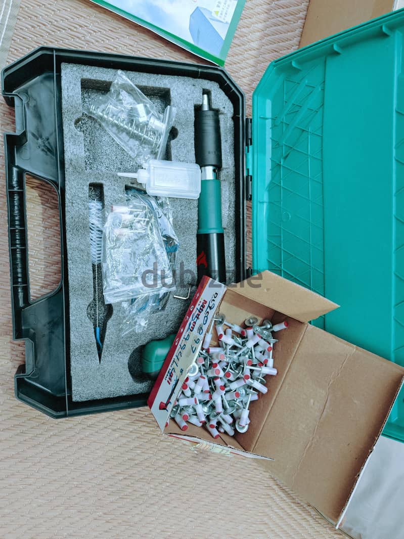 wall pin gun tool with pins almost new 1