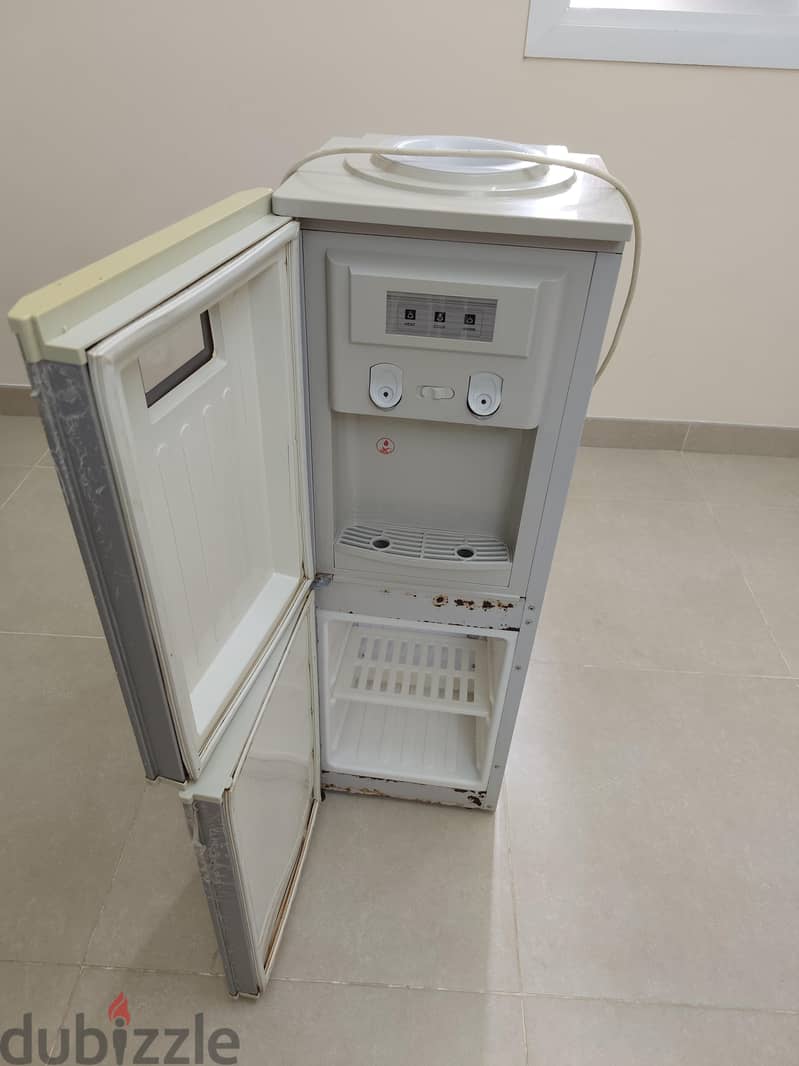 hot and cold water dispenser with cooling storage 1