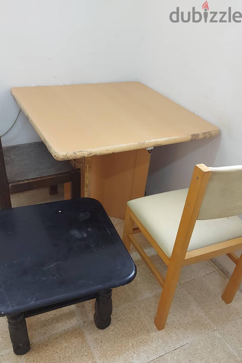 1 wooden table, 2 wooden chairs & a teapoy 1