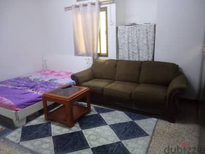 Room for rent in Al Khuwair.