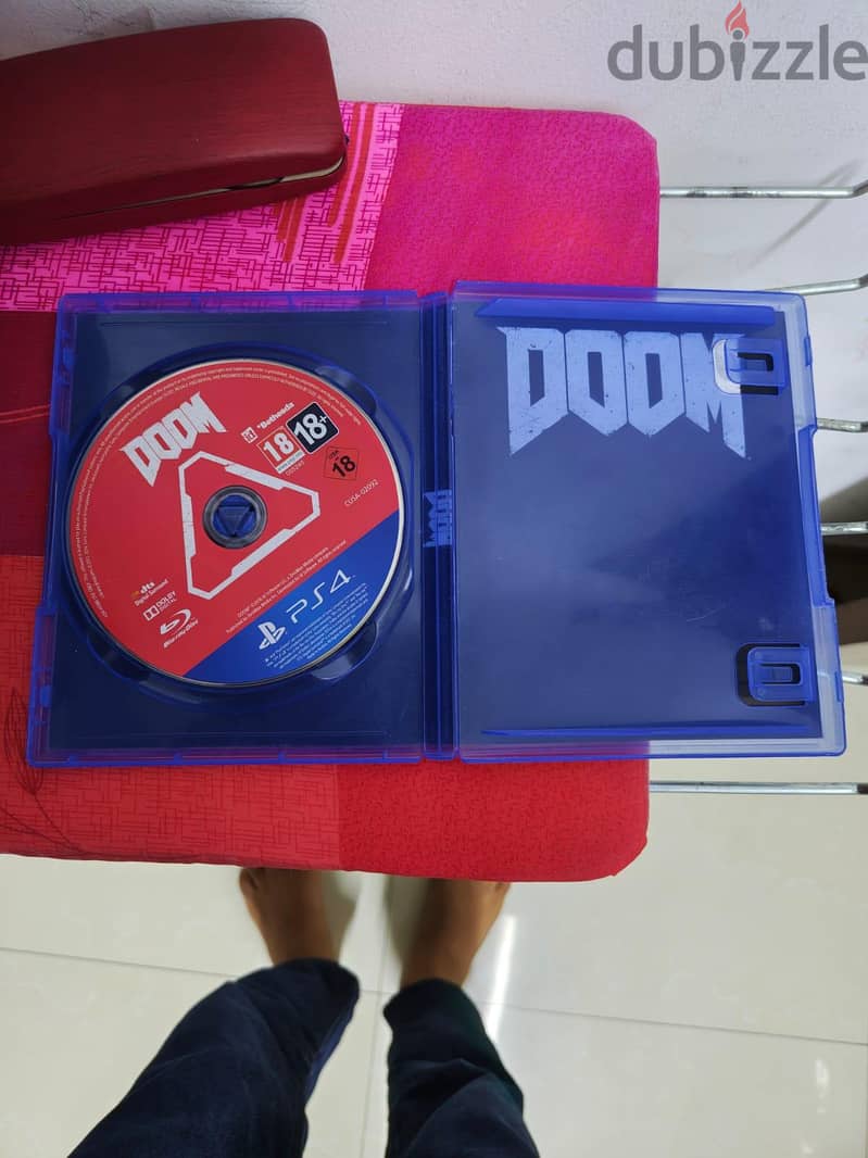 ps 4 CDs for sale doom cd have scratches but working fine 1