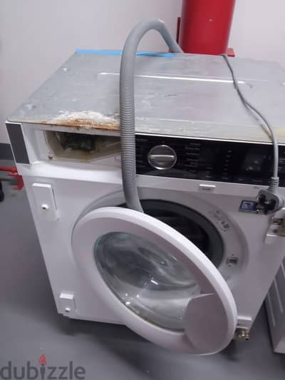 Good condition in built washing machine from al mouj