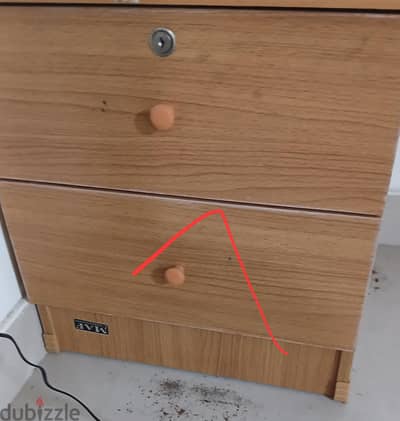 mbd ruwi near sparWardrobe and side table and bed