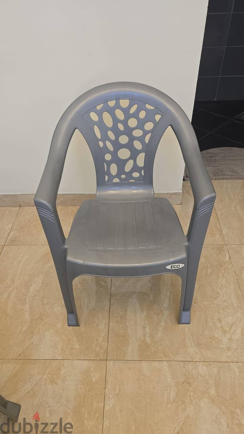 Plastic chair with hand rest 1