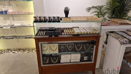 artificial gold jewellery and display counter for sell