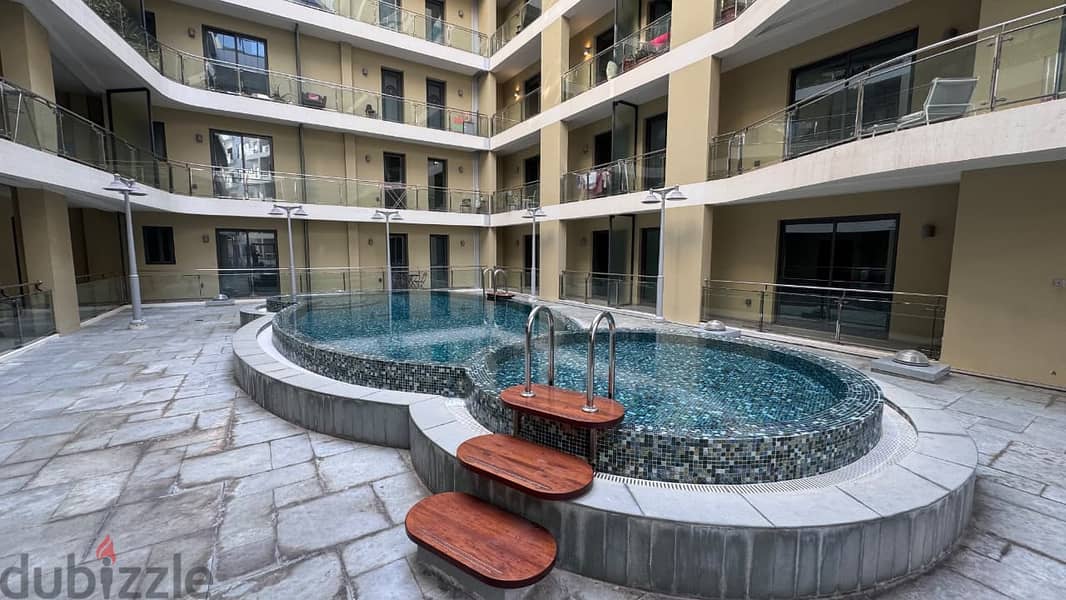 1 BR Cozy Apartment in Muscat Hills with Shared Amenities 1