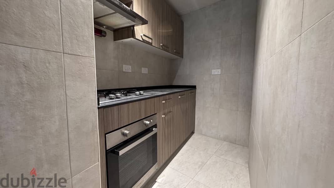 1 BR Cozy Apartment in Muscat Hills with Shared Amenities 6