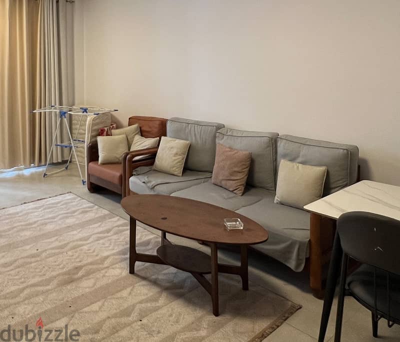 SOFA WITH WOODEN BASE OMR 60 1