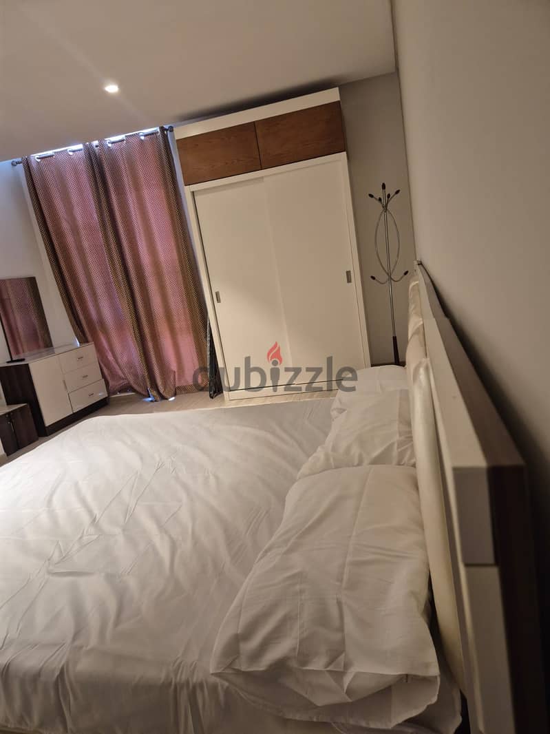 Luxury Furnished 2-Bedroom Apartment IN Muscat Grand Mall | Prime Location 12