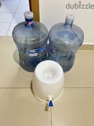 Water cans and water dispenser