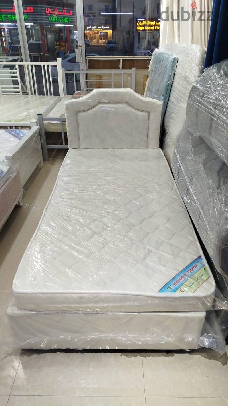 tv stand and dressing table and bed 10