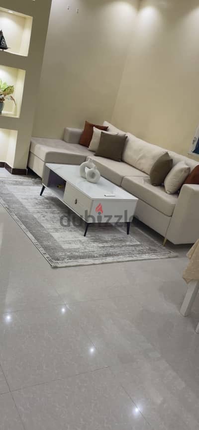 Elegant L-Shaped Sofa Set with Coffee Table & Rug